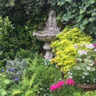 Water feature in small courtyard garden Witney